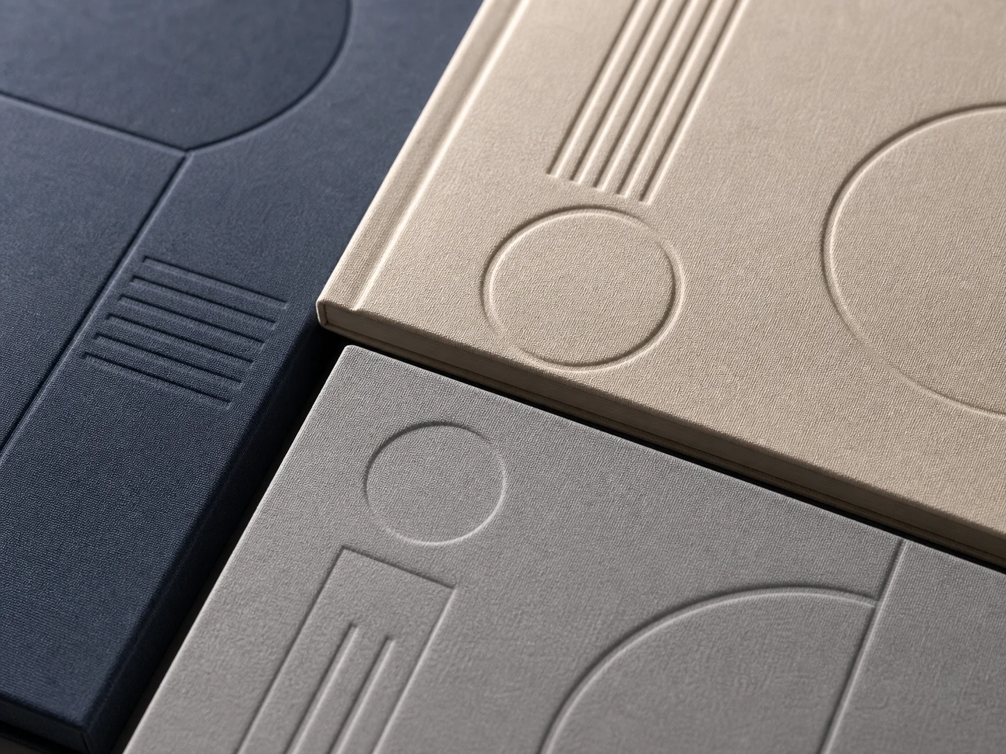 Embossed and debossed tactile finishing samples on book covers