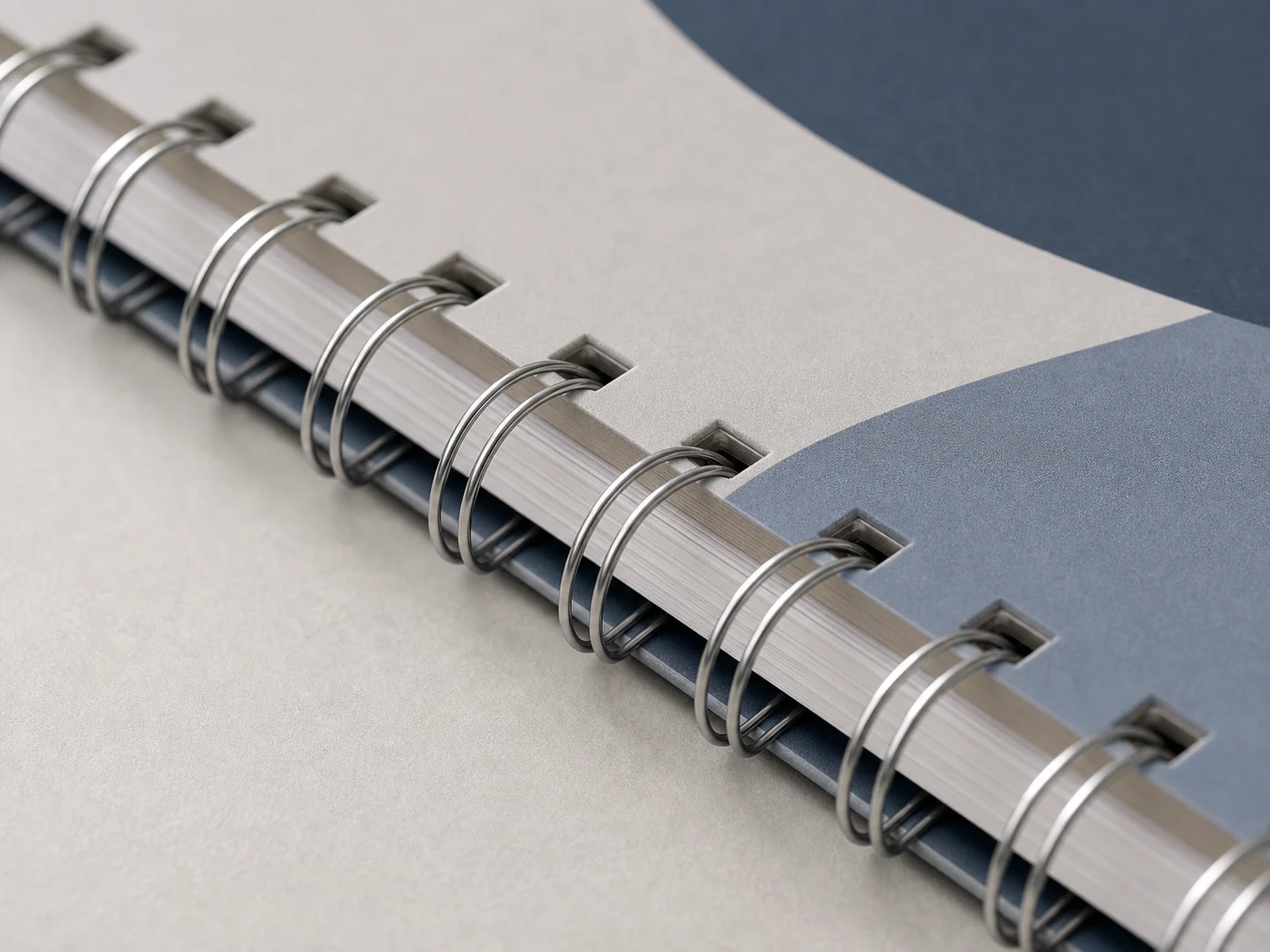 Wire-O binding hardware detail with punched pages