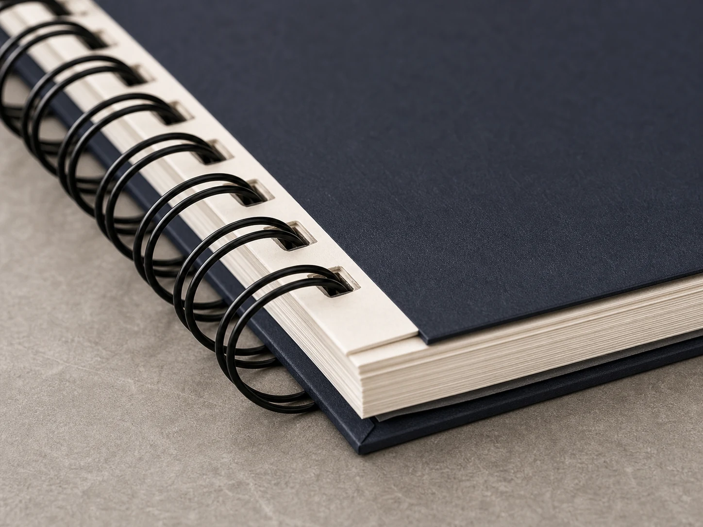 Close-up of clean Wire-O binding on a sample book